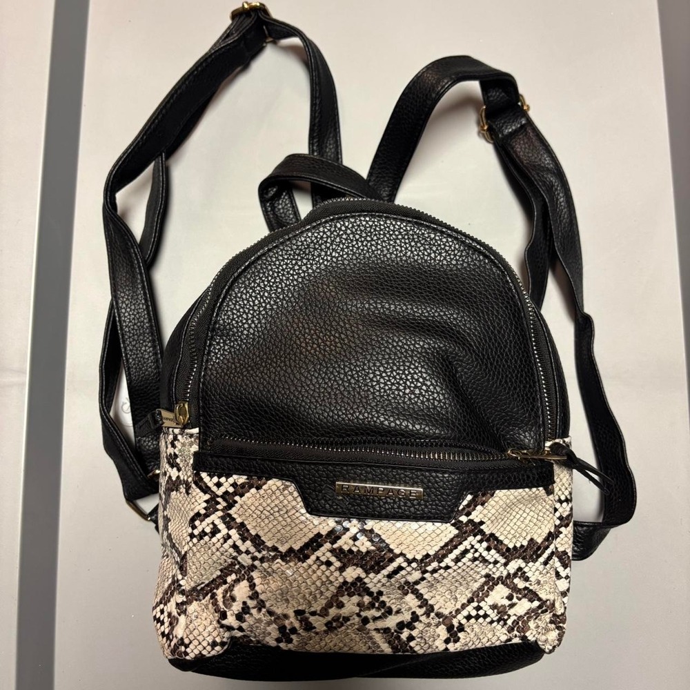 Black and snakeskin leather backpack purse by Rampage